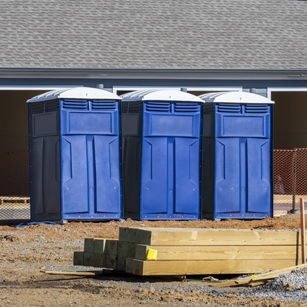 what is the cost difference between standard and deluxe portable restroom rentals in Centralia IL